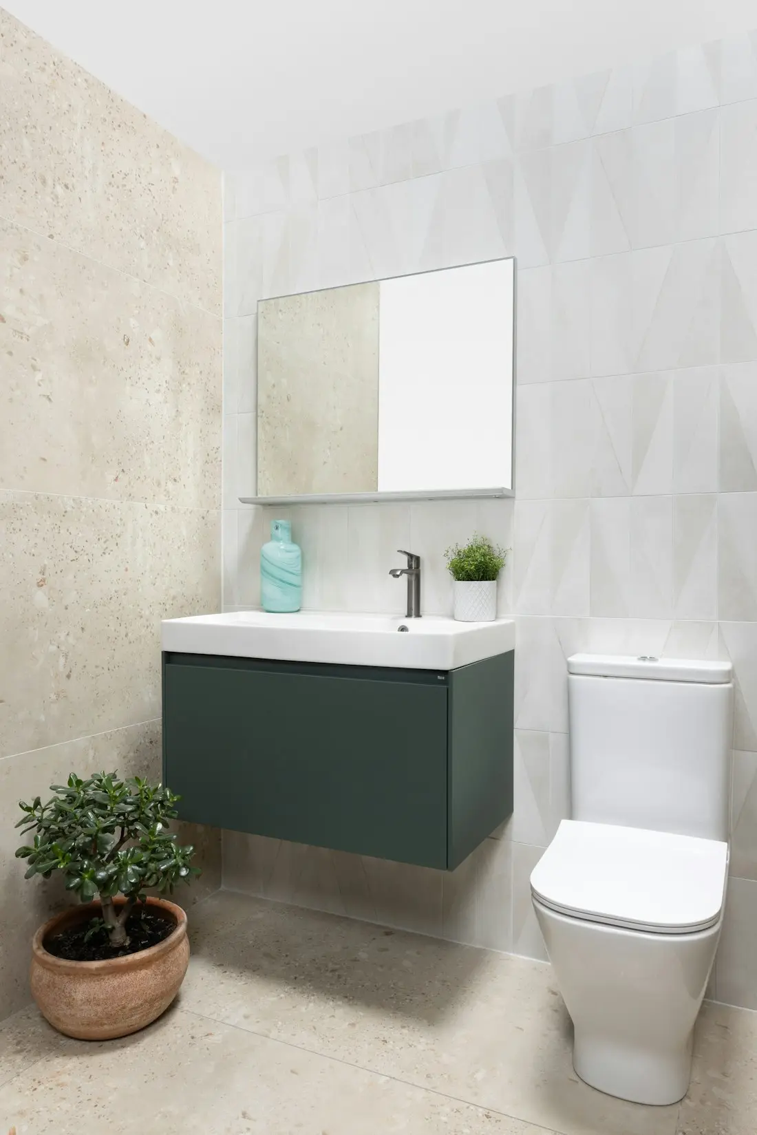 Powder room accent wall — Glazed subway 3×12 in., marble-look panel