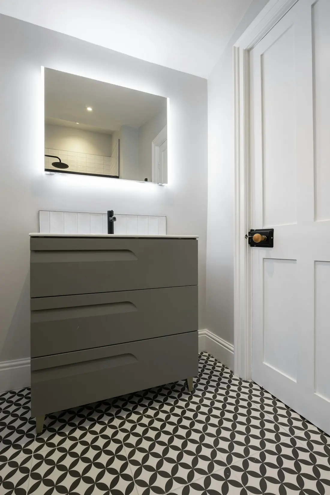 Patterned bathroom floor — Encaustic-look porcelain, 8×8 in.